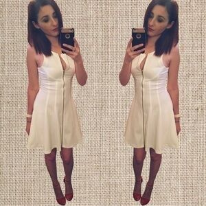 White fitted zipper down flair dress